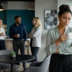 Professional experiencing anxiety during workplace small talk.